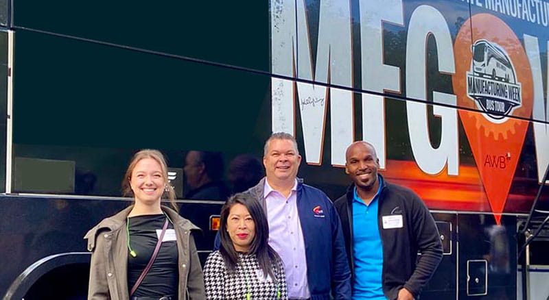 MFG week bus and Banner employees