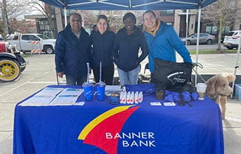 Banner Bank employees at an event booth in Ballard, WA