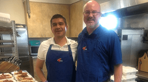 Banner Bank employees serving food at Christian Aid Center