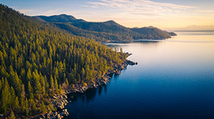 Landscape of mountains, trees and a lake