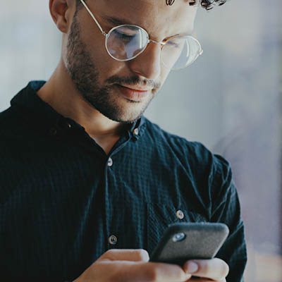 man looking at his phone