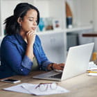 Woman checks her eStatements on a laptop using Banner Bank's online banking 