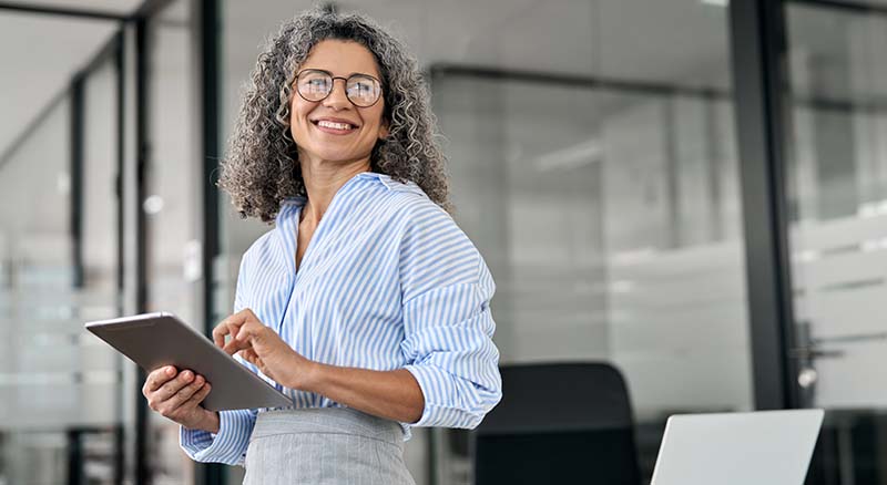 Person on tablet in office