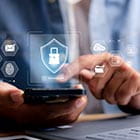Person using a phone with secure icons overlayed