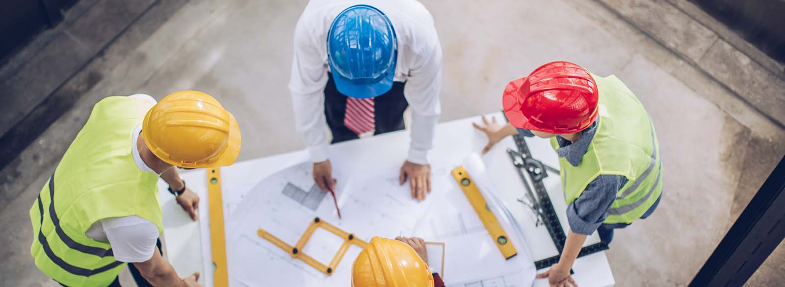 Contractors looking at paperwork