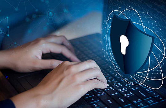 Person types on a secured computer