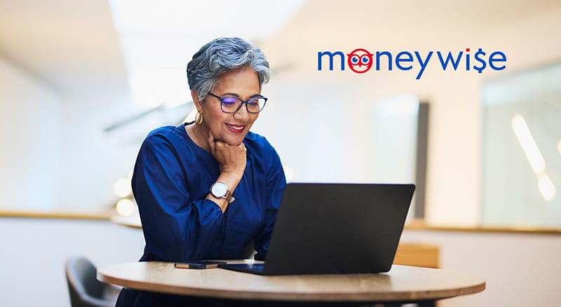 Person looking at laptop and MoneyWise logo