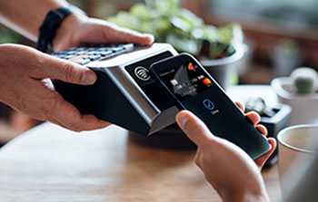 Digital wallet being used at a credit card reader
