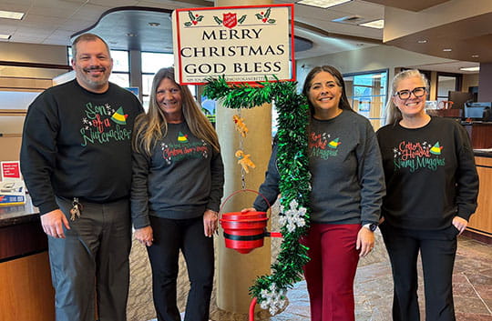 Bankers collecting donations for the Salvation Army