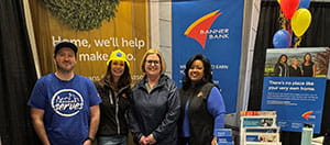 Banner employees at a home show booth