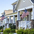 Outside of homes with American flags