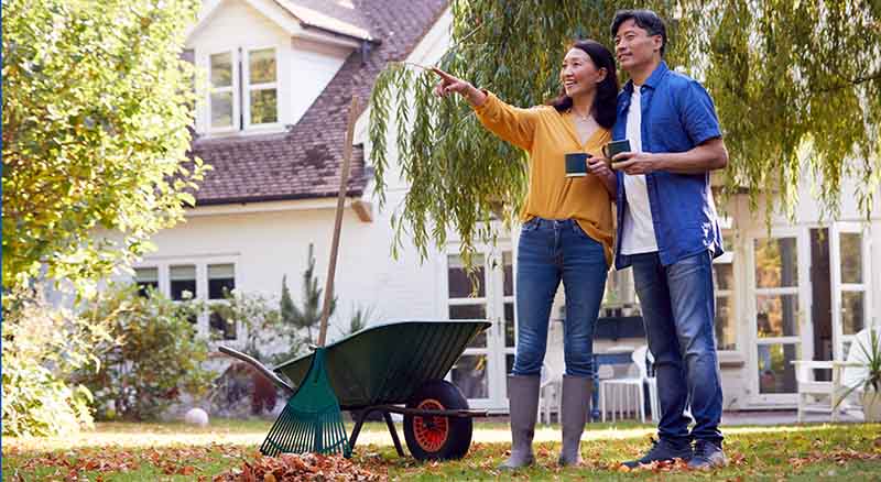 Couple feeding their baby on the kitchen counter