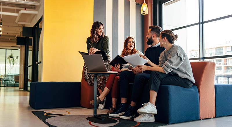 People talking in an open office space